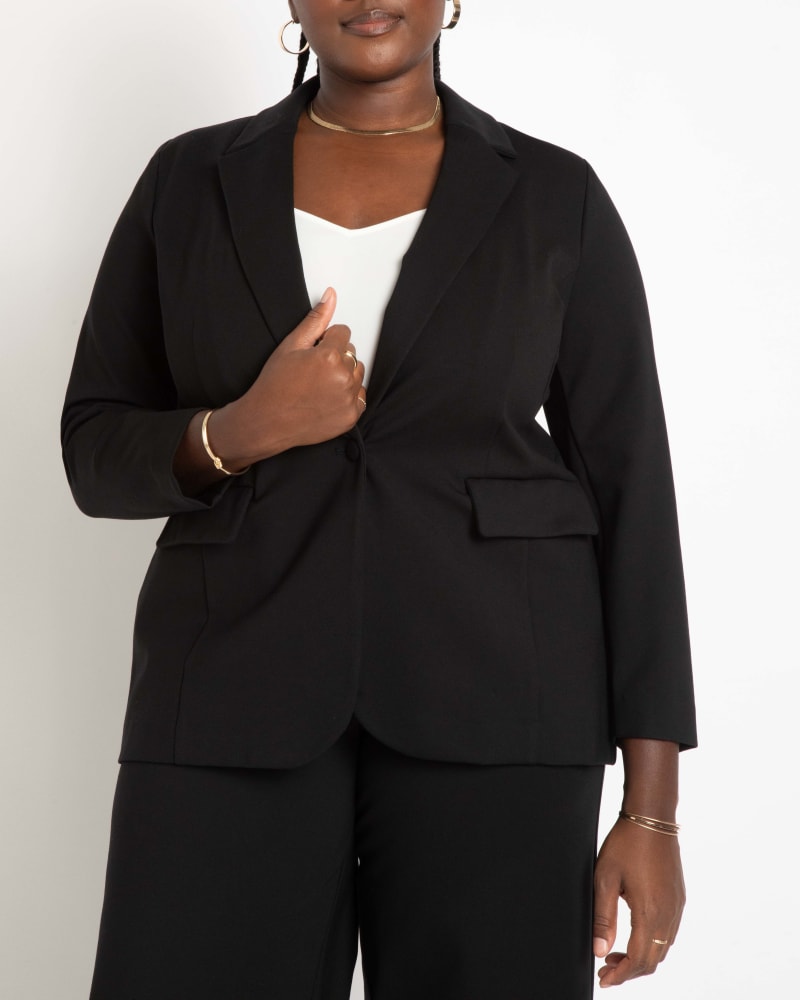 Front of a model wearing a size 28 The Ultimate Stretch Suit Long Line One Button Blazer in Totally Black by ELOQUII. | dia_product_style_image_id:273015